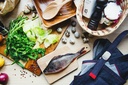raw-fish-with-vegetables-put-on-cutting-board-near-apron-39520526tnfBtOgsC7DK